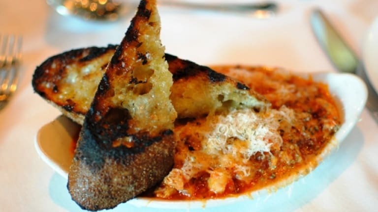 Trippe alla Parmigiana: ricetta di trippe al pomodoro con Parmigiano Reggiano.